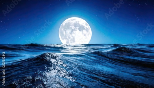 Majestic Moon Over Ocean Waves - A Nighttime Serenity.