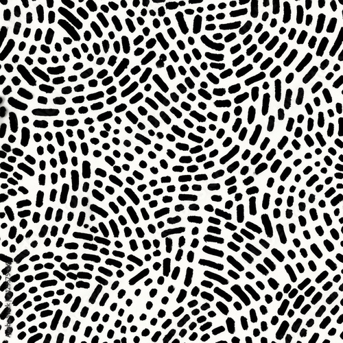 Visually striking black and white pattern composed of irregular short brush strokes creating dynamic abstract texture