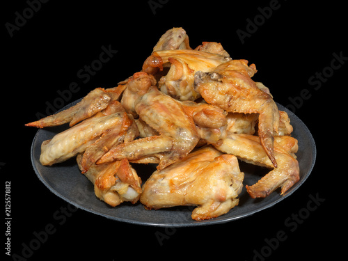 Roasted Chicken Wings on Black Background