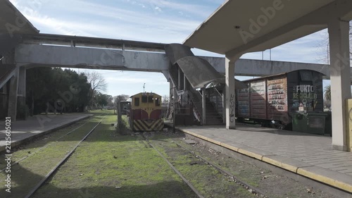 Platforms, footbridge, and recreational handcar at the historic Meridiano V railway station in La Plata, Buenos Aires, Argentina. D-Log M, 10-bit color, flat log profile.