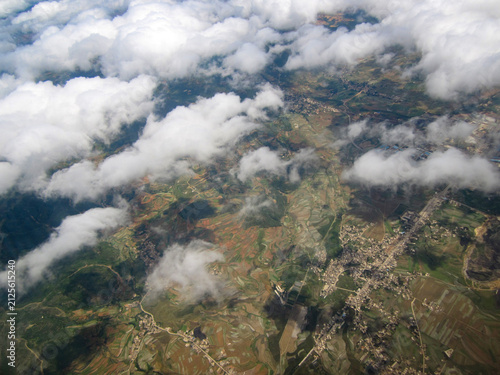 Photography Aerial view of clouds floating over vast land area