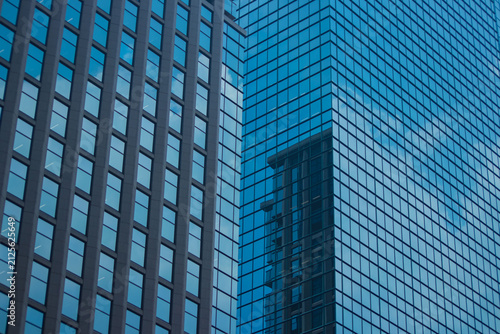 A cityscape of cloud reflecting the building at the business town telephoto shot