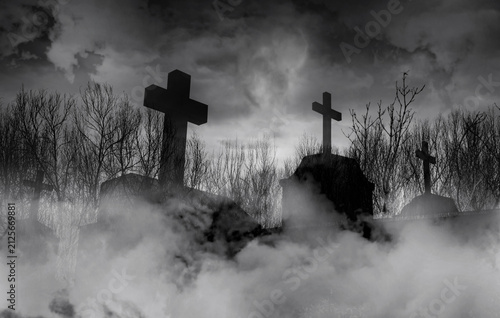 Halloween day concept. Cemetery or graveyard in the night with dark sky. Haunted cemetery. Spooky and creepy burial ground. Horror scene of graveyard. Funeral concept. Halloween day background.