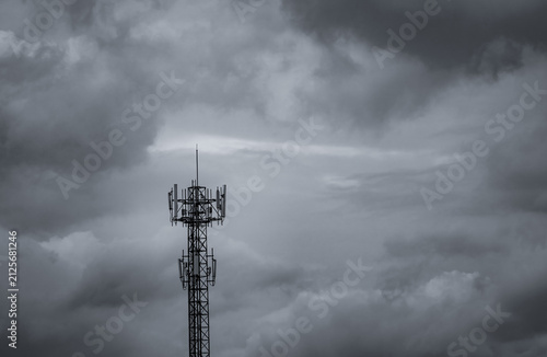 Canvastavla Cellular communication tower with storm clouds