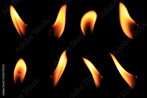 Realistic candle flames isolated on black background, featuring burning candle fire for overlays, photo compositing, visual effects, motion graphics, religious themes and graphic design.
