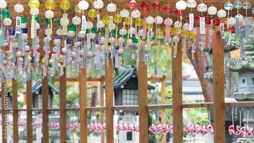 Fotografie Traditional glass wind chimes and pinwheels decorated at Japanese Shinto shrine