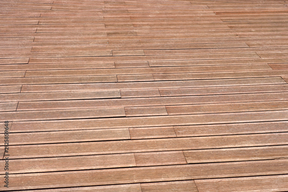 Obraz premium Dark brown composite wooden deck flooring planks.