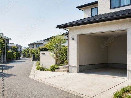 Modern Japanese suburban home with empty garage after voluntary driver's license surrender