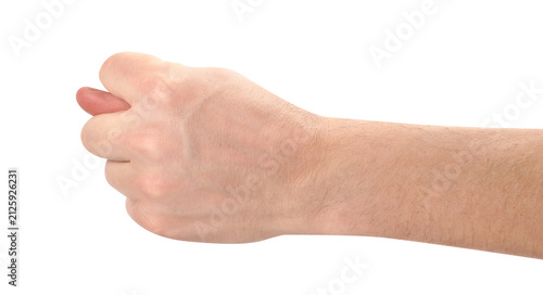 Male hand showing fig sign with thumb between fingers, isolated on transparent cutout background