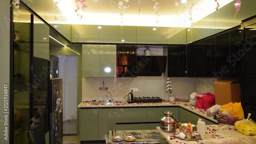 Griha Pravesh house warming ceremony in Mumbai. Traditional Indian kitchen blessing ritual.