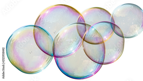 Iridescent soap bubbles overlapping reflecting rainbow colors, isolated on transparent background