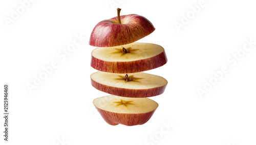 Fotografie Red apple sliced into four pieces, isolated on transparent background