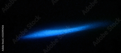 A blurred, glowing blue shape against a dark grain texture background, enhanced with noise, abstract design suitable for posters, headers, covers, wallpapers, banners, and backdrops