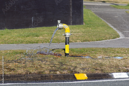 Photography Fire hydrant standpipe, yellow painted, uncontrolled style