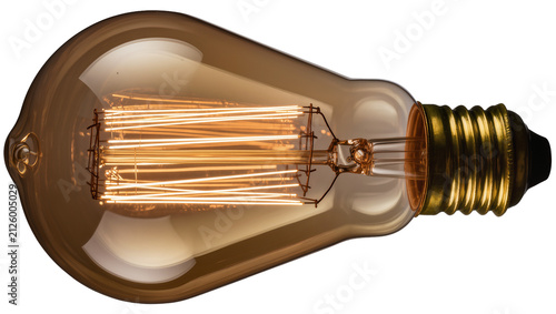 Fotografía Edison incandescent light bulb with brass screw base, isolated on transparent ba