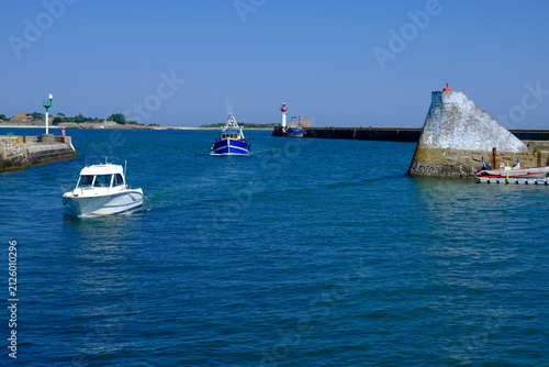 Boats returning to port at Saint-Vaast-la-Hougue, a commune in the peninsula of Cotentin in the Manche department in Lower Normandy in north-western France