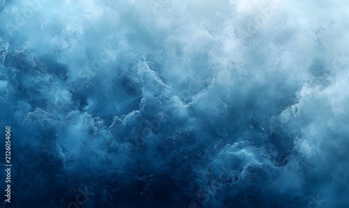 Close-up view of turbulent, deep blue ocean water with white foam and swirling currents.