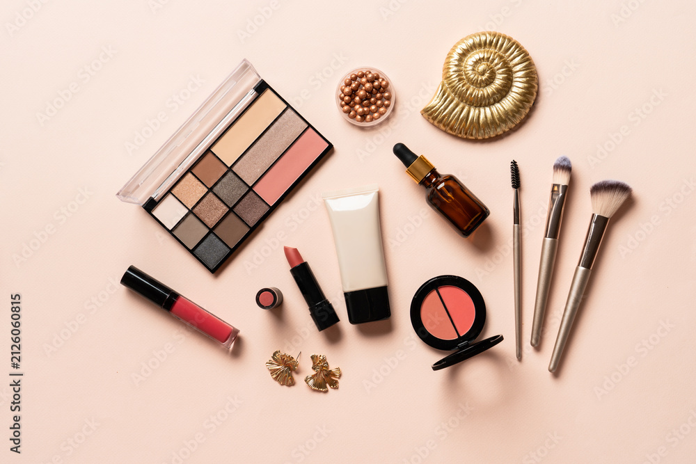 Naklejka premium Make up products. Shadow palette with brushes, lipstick, cream and others.