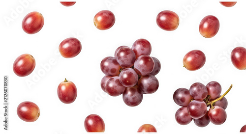 Fresh red grapes scattered with small clusters of fruit