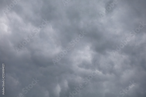 Dark clouds gather in the sky before a storm