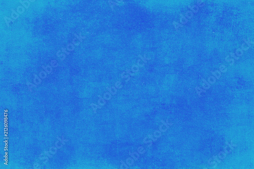 Abstract blue watercolor background. The color splashing on the paper. Hand drawn.