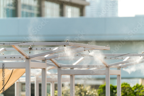 Sprinklers, cooling water mist, water cooling in the restaurant garden