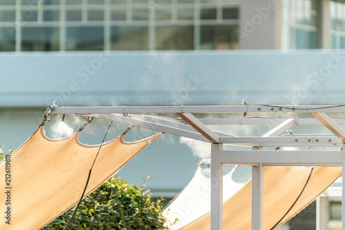 Sprinklers, cooling water mist, water cooling in the restaurant garden