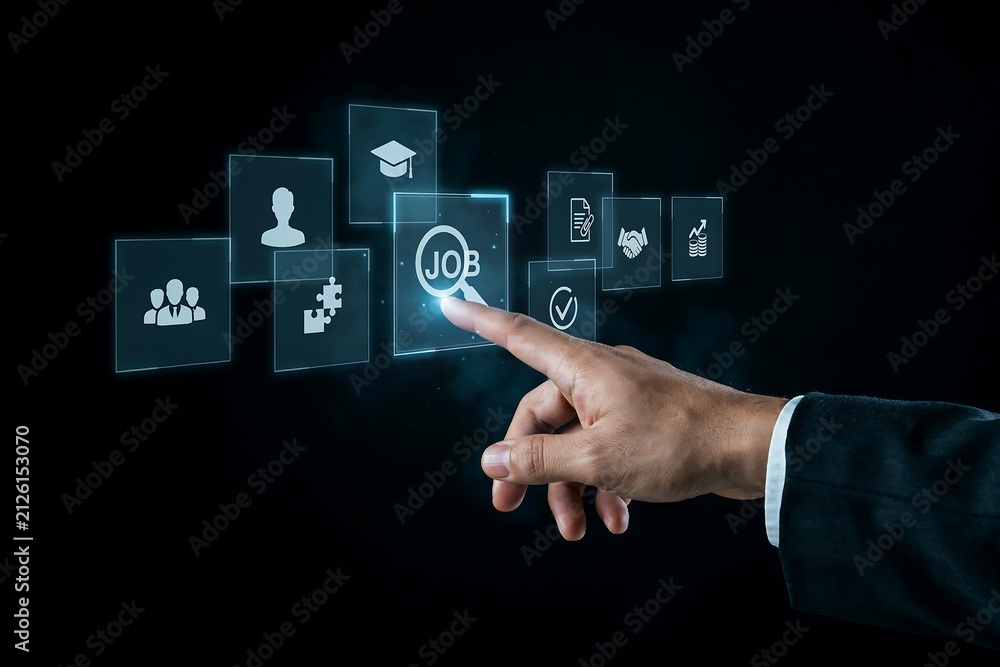 Obraz premium Finger points to a glowing job icon on a digital display surrounded by other business-related icons.