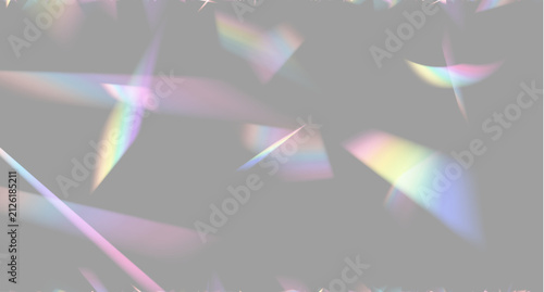 Fotografía Multicolored light refractions breaking into neon streaks and soft beams on a bl