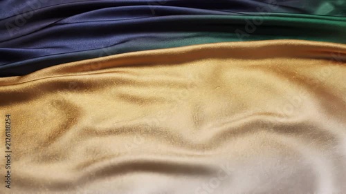 Flowing silk-like aurora with vibrant colors and smooth textures creating an abstract visual effect in motion for artistic, design, or decorative purposes
