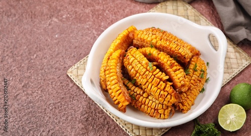 Photography Corn ribs are processed grilled corn that is shaped like ribs.