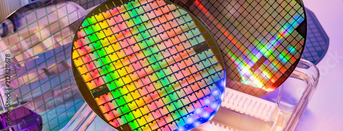 Silicon Wafers in white plastic holder box used in electronics for the fabrication of integrated circuits.AI Hardware and Semiconductor Industry Concept.