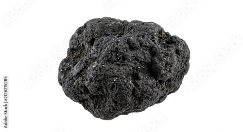 Fotografie Close-up view of a porous black volcanic rock on a white background