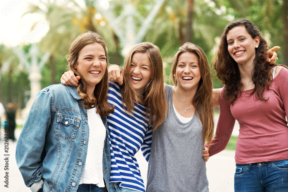 Fototapeta premium Hug, travel and funny with friends in park for connection, summer vacation and bonding together. Happy, adventure and gen z hangout with portrait of woman outdoor on weekend break for holiday
