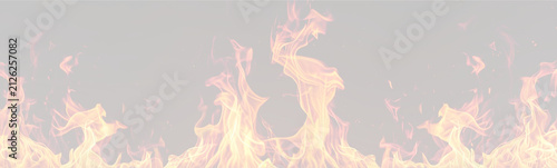 Dancing orange and yellow flames rising from a fire against a black background with sparks on transparent background