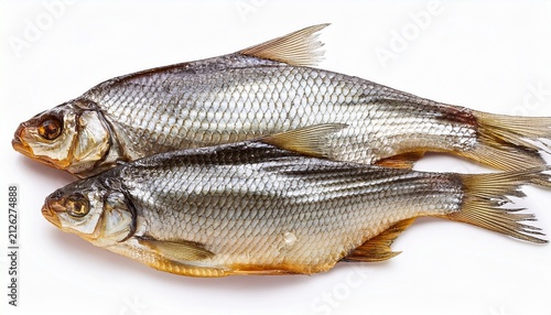 dried river fish pair with silver scales isolated on white background cutout background