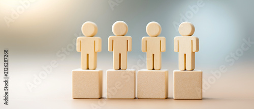 Wooden Figurines on Podium: A symbolic representation of hierarchy or achievement, four simple wooden figures stand tall on individual podiums, bathed in soft, warm light.