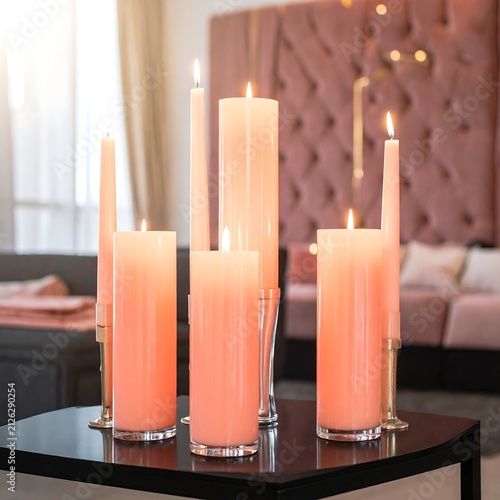 Elegant Coral Candles Arranged on a Modern Table in a Luxurious Living Room.