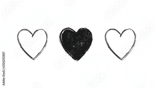 Three hearts drawn with charcoal on a white background, one solid black