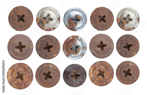Collection of rusted screw heads with varied oxidation patterns