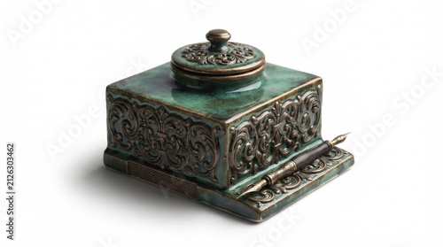 Antique green glazed inkstand with ornate bronze scrollwork, lidded inkwell and double-nib dip pen, isolated on white
