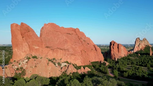 Flying backwards away from red rocky cliff in Colorado