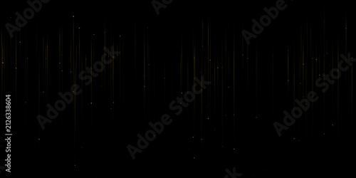 Abstract golden light streaks and particles on black background