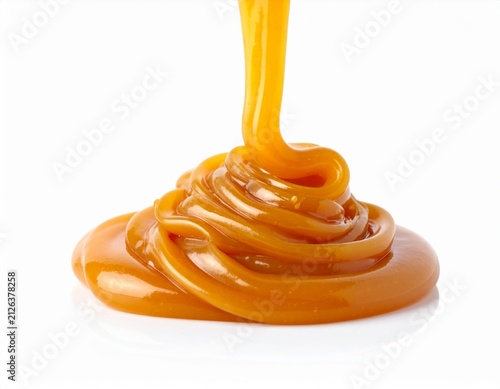 Isolated flowing stream of caramel or toffee, sweet splash for dessert or topping design
