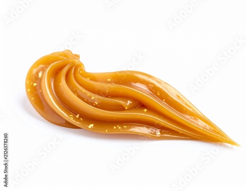 Isolated flowing stream of caramel or toffee, sweet splash for dessert or topping design
