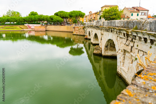 Tiberius Bridge over the river in Rimini. Italian classical architecture. A city landmark. Italy travel