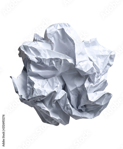 Crumpled Paper Ball: A single, white crumpled paper ball sits isolated, its texture revealing the folds and creases from repeated attempts, symbolizing frustration or a rejected idea.