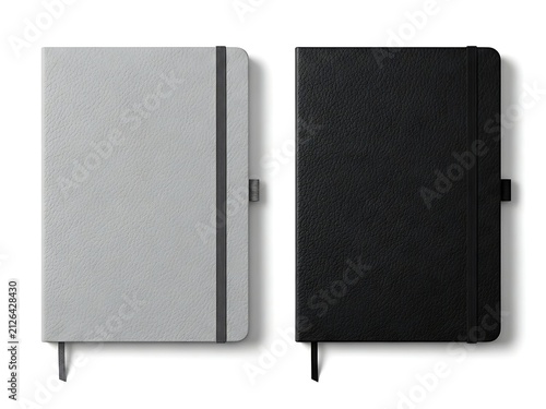 Two closed notebooks in gray and black colors