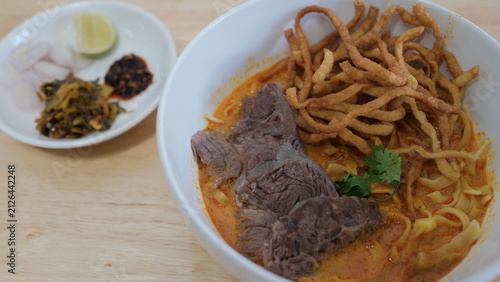 Canvastavla Noodle with meat pork meatball chicken curry soup , Thai called khao soi kai ,No