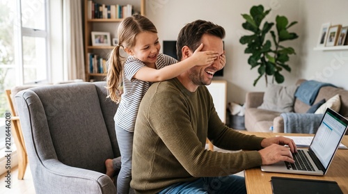 Playful Daughter Covering Her Father’s Eyes While He Works on a Laptop at Home During a Joyful Family Break and Bonding Moment